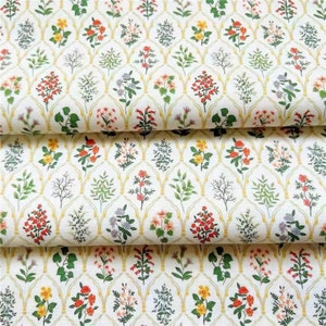 May include: White fabric with a repeating pattern of yellow, green, red, and pink flowers in a trellis design.