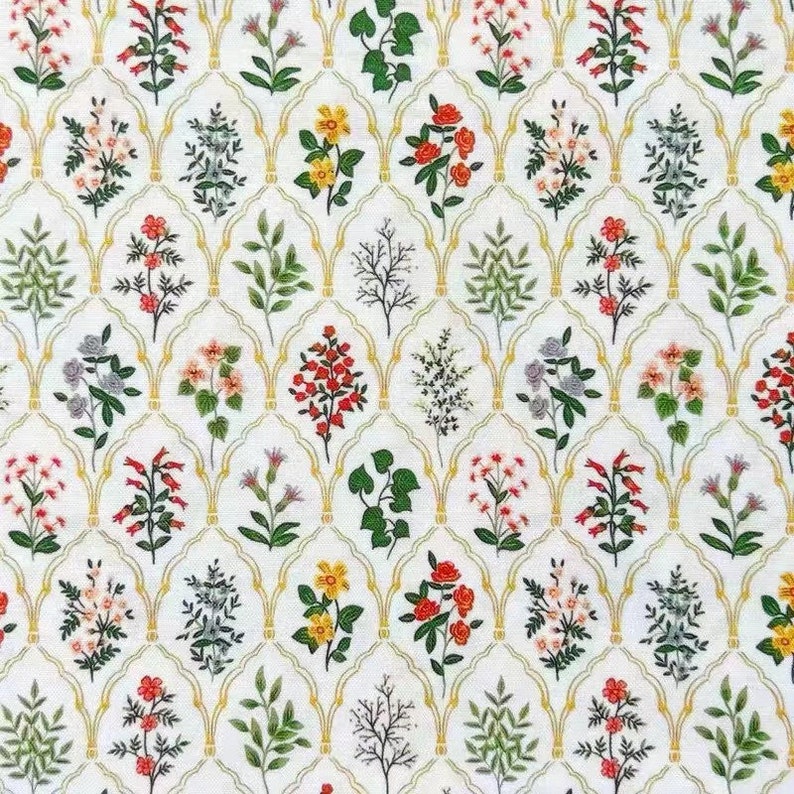 May include: A white fabric with a repeating pattern of various flowers and leaves in shades of red, yellow, green, and blue. The flowers and leaves are arranged in a grid pattern within gold arches.