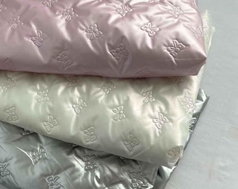 Schleife glänzend Steppstoff,Quiltstoff,Glänzender Stoff,Jackenstoff,Gefütterter Stoff,Nähstoff,Winterstoff,Tierstoff,Stoff 1/2 Yards