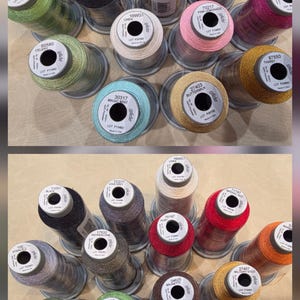 May include: A collection of colorful spools of Glide thread, showcasing a variety of shades including black, gray, pink, green, and gold. Each spool is labeled with a unique color code and name, perfect for sewing and crafting projects.