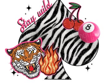 May include: A graphic design featuring a zebra-striped spade shape with a tiger head, cherries, a pink eight ball, and flames. The phrase "Stay Wild" is written in pink script.