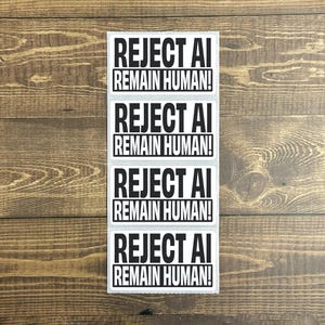 May include: A vertical sheet containing four rectangular stickers, each featuring the bold black text REJECT AI REMAIN HUMAN! in a sans-serif font. The stickers are arranged in a single column, with each individual label clearly defined by a white border.