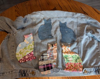 Cat silhouette, I make them out of material, jeans, a cutter quilt I have