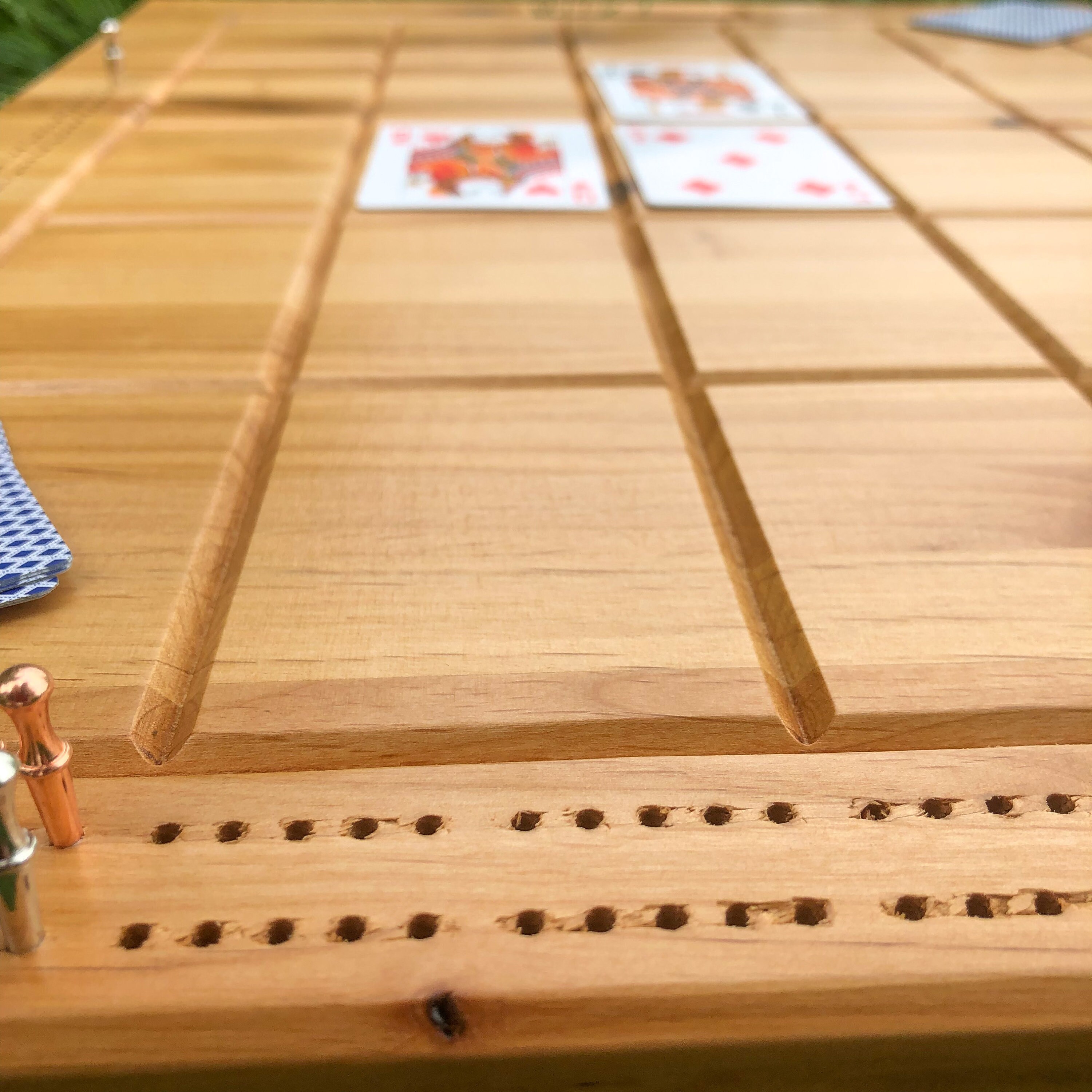 Cross Cribbage Board Game With a Storage for Stainless Steel Pegs for