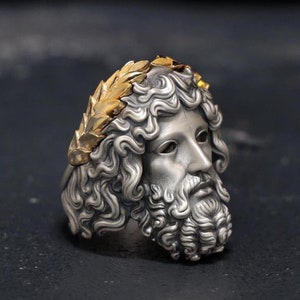 Elevate your style with this striking 14k gold-plated sterling silver Zeus ring, designed for men who appreciate bold and powerful statement jewelry. Handcrafted with intricate Greek mythology details, this unique ring is the perfect accessory to add sophistication and strength to any outfit. Ideal for those seeking a distinctive and luxurious Greek-inspired ring that exudes mythological charm and elegance.