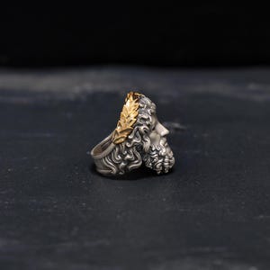 Styled on the hand, this Greek-inspired Zeus ring instantly elevates any outfit with a touch of mythological elegance and masculine sophistication. Perfect for daily wear or special occasions, this ring combines the power of ancient Greek gods with modern style, making it a versatile piece for the confident man.