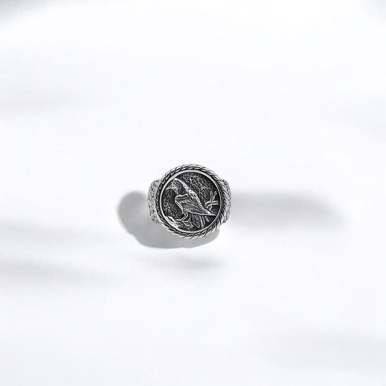 A mystic Viking raven ring made from sterling silver and carefully oxidized to highlight the deep engravings, this ring captures the essence of Norse tradition and divine insight. A standout piece for any man seeking to express power, mystery, and personal meaning through jewelry.