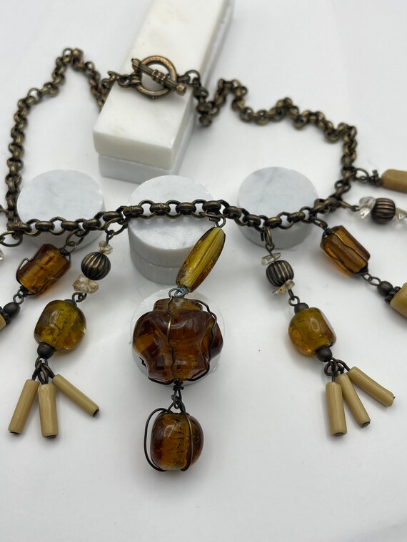 Unusual festoon style beaded vintage necklace with ho… Gem