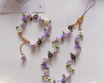 Pulsera floral morada hecha a mano, correa para teléfono con cuentas de glicina