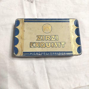 Scatola di latta Zirzi Exquisit 1920/30 proveniente da una tenuta.  Scatola di sigarette.