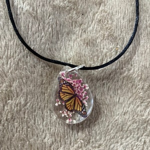 Pink  adjustable Monarch butterfly necklace and pendant with pink flower