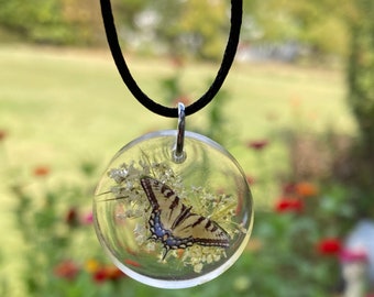 Adjustable tiger swallowtail butterfly necklace  pendant highlighted with  queen lace flowers.
