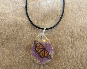 Purple adjustable Monarch butterfly necklace and pendant with purple flower