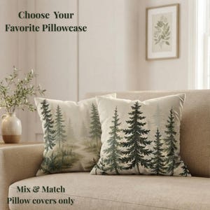 May include: Two square pillowcases featuring a printed forest scene with dark green pine trees against a light cream background. The text "Choose Your Favorite Pillowcase" and "Mix & Match Pillow covers only" is printed in dark green on the image.