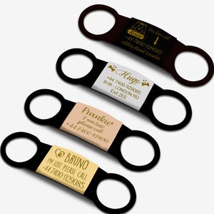 May include: Four black dog tag holders with personalised engraved tags. Each tag has a different name, phone number, and message. The tags are gold coloured with black text.
