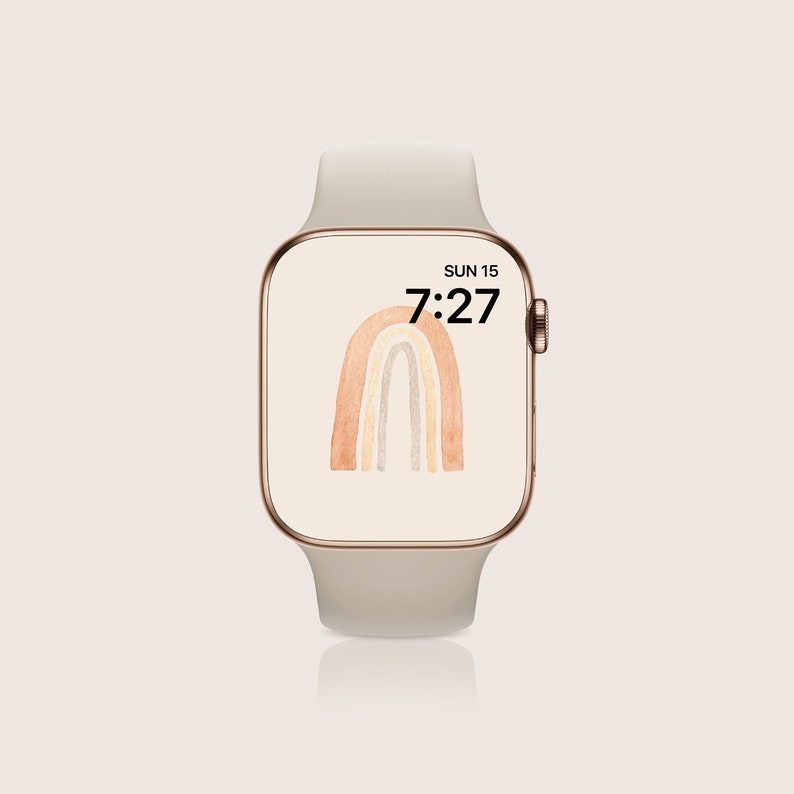 May include: A white Apple Watch with a rainbow-colored watercolor design and the time 7:27 displayed on the screen. The date is displayed as SUN 15.