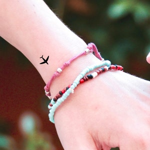 Tiny Airplane Temporary Tattoo