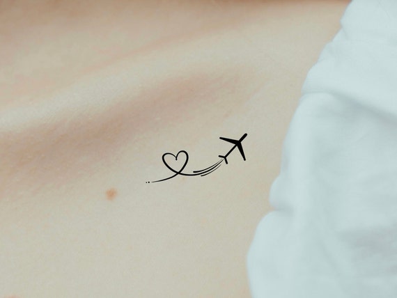 Tattoo tagged with: small, paper plane, airplane, tiny, travel, ifttt,  little, joaquinforero, blackwork, minimalist, game, inner forearm, medium  size, origami | inked-app.com