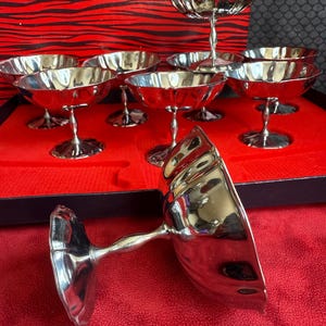 Vintage stainless steel ice cream cups, made in France 70s, set of 10 tulip-shaped stainless steel cups on a foot.