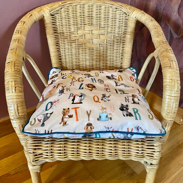 Chair, children's armchair in vintage wicker with its cushion
