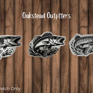 May include: Three black and white fish patches with open mouths, set against a wood grain background. The text "Oakstead Outfitters" is at the top, and "Patch Only" is at the bottom.