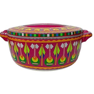May include: A pink and white round serving dish with a colourful geometric design. The dish has a lid and two handles.