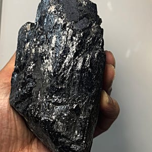 Grounding black tourmaline raw mineral rock