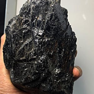 Grounding black tourmaline raw mineral rock