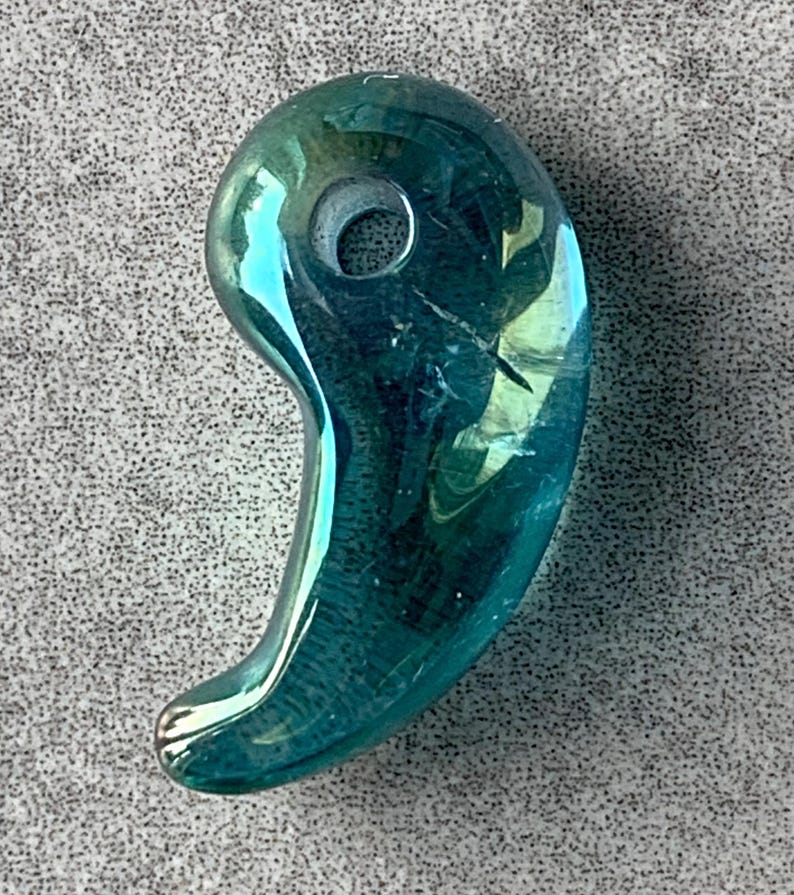 Polished magatama amulet