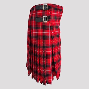 May include: A red, black and white tartan kilt with two black leather straps and buckles. The kilt is pleated and has a fringed edge.