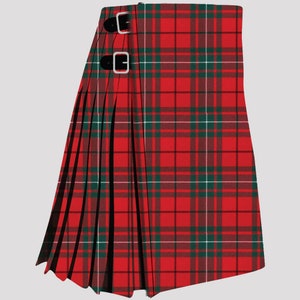 May include: A red, green and white tartan kilt with black buckles. The kilt is pleated and features a traditional design.