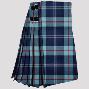May include: A blue, red and white tartan kilt with black buckles.