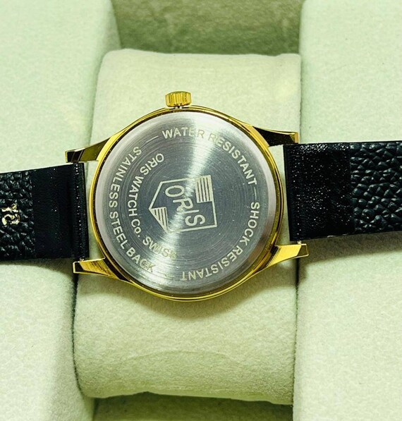 Rare montre-bracelet vintage ORIS à remontage manuel avec cadran vert pour  homme -  France