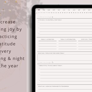 May include: A digital planner displayed on a tablet, featuring daily gratitude prompts. The screen shows sections for intentions, affirmations, and things to be grateful for. Text on the left reads: "Increase lasting joy by practicing gratitude every morning & night of the year."