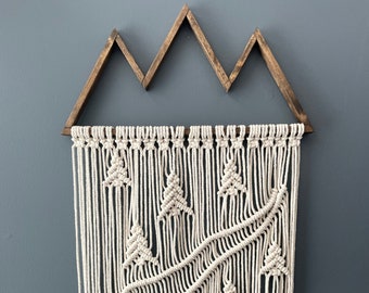 Mountain macrame forest scene with a river/path