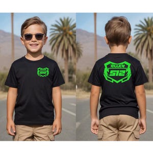 May include: A black short-sleeved t-shirt featuring a bright neon green graphic on the front left chest and a larger matching neon green graphic on the back. The graphic displays the text "ALLEN" above the number "512" inside a geometric shape.