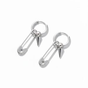 May include: A pair of silver-colored hoop earrings. Each earring features a safety pin design with a pointed cone charm. The earrings are displayed against a white background, highlighting their metallic sheen and unique style.