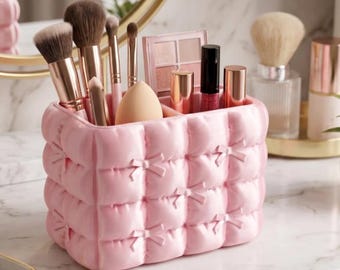 Organiseur à maquillage matelassé avec noeuds
