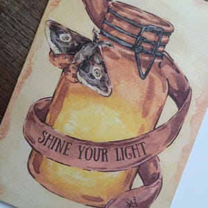 Cartão de felicitações - Shine Your Light - Cartão de felicitações em branco 5x7 com mariposa e lanterna