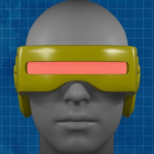 Puede incluir: Una visera amarilla con una lente rectangular roja es usada por una cabeza de maniquí gris. La visera tiene un diseño futurista, con bordes redondeados y un acabado liso y brillante. El fondo es una cuadrícula azul.