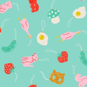 May include: A repeating pattern of colorful food and animal-shaped ornaments on a teal background. The ornaments include strawberries, pickles, mushrooms, fried eggs, pretzels, squirrels, gummy bears, and cats. Each ornament has a white string.