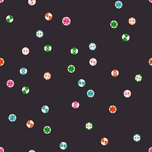 May include: A dark gray background is scattered with colorful, circular buttons. The buttons feature various designs, including flowers, dots, and split colors in shades of pink, orange, green, and blue. The buttons are evenly spaced.