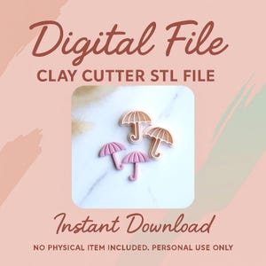 Puede incluir: Imagen de un archivo digital para cortadores de arcilla, con diseños de paraguas en rosa y beige. El texto incluye "Digital File", "CLAY CUTTER STL FILE" y "Instant Download". Fondo con efecto mármol.