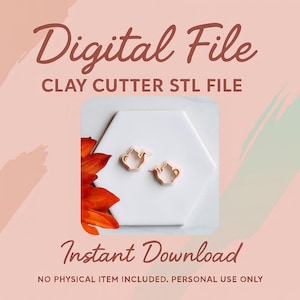 May include: A digital file graphic with the words "Digital File" and "Instant Download". The image features two small, light-colored teapot-shaped clay cutters on a white hexagonal tile. The background is a soft pink with an orange floral accent.