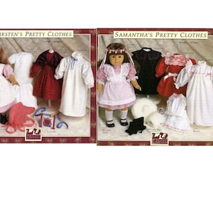 May include: Two sets of doll clothes for American Girl dolls. The first set is for Kirsten and includes a white dress with a pink and white gingham trim, a white nightgown, a red dress with a black shawl, and a white apron. The second set is for Samantha and includes a white dress with a pink and white gingham trim, a black dress, a red dress with a white lace collar, and a white nightgown.