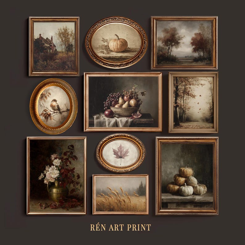 May include: A gallery wall set of nine framed art prints featuring autumn-themed paintings of landscapes, a pumpkin, a bird, a fruit bowl, a leaf, wheat, and flowers. The frames are gold and brown. The text REN ART PRINT is at the bottom.