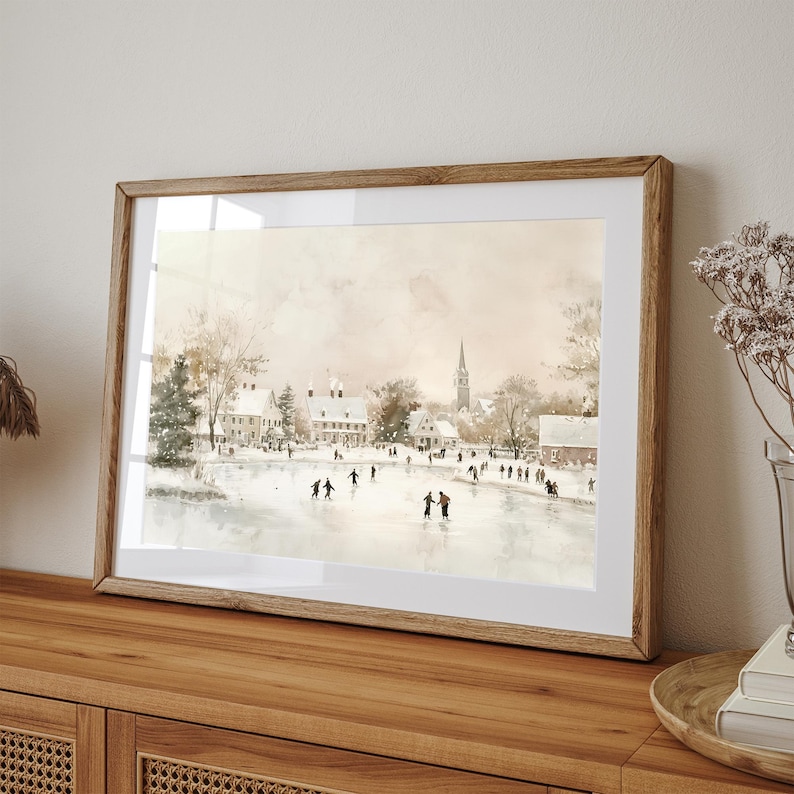 May include: A watercolour painting depicting a winter scene with a church spire in the background and people ice skating on a frozen lake. The buildings are painted in shades of brown and white, and the sky is a soft blue.