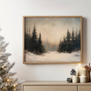 May include: A framed painting of a snowy forest scene with tall evergreen trees in the foreground and a misty background.