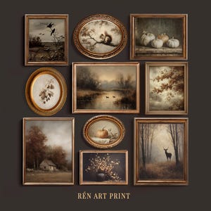 May include: A gallery wall collection of nine framed art prints featuring nature scenes, including a squirrel, pumpkins, a deer, a cottage, and birds. Each piece is encased in a gold-toned frame. The text REN ART PRINT is centered at the bottom.
