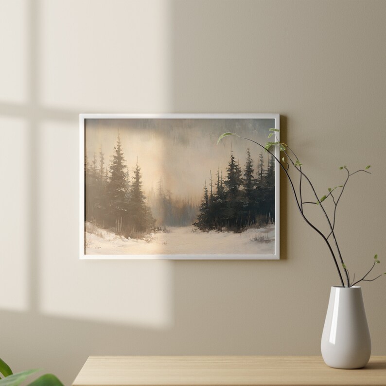 May include: A framed painting of a snowy forest scene with tall evergreen trees in the background and a path leading into the distance. The sky is a soft, muted blue with hints of pink and orange.